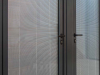 large doors with blinded glass installed