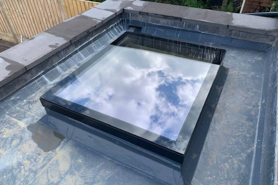 a skypod window on the roof of a house