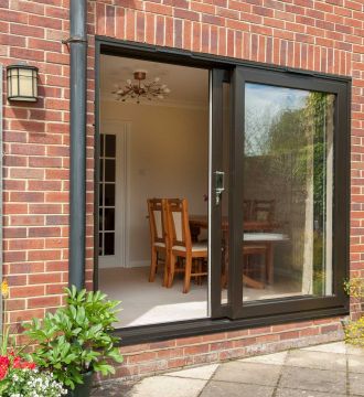 kitchen table surrounded by sliding patio doors in modern home