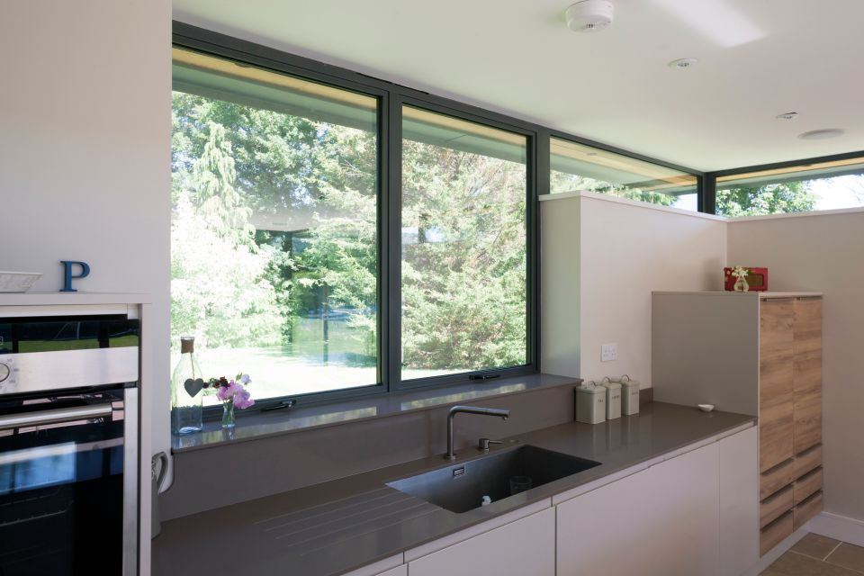 Kitchen windows above a sink in a modern home