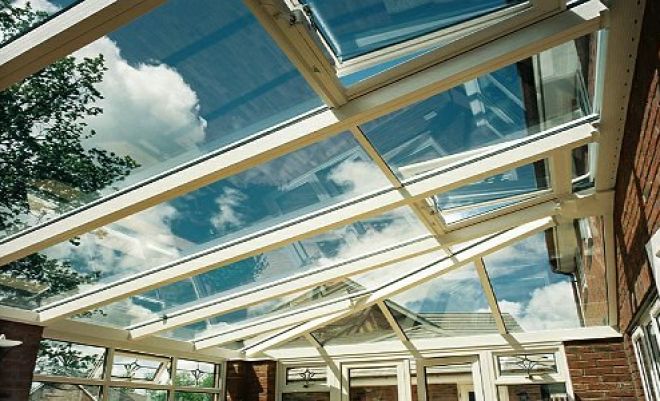 conservatory with bronze self-cleaning roof glass installed