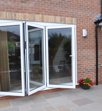 large open bi-fold doors in modern home