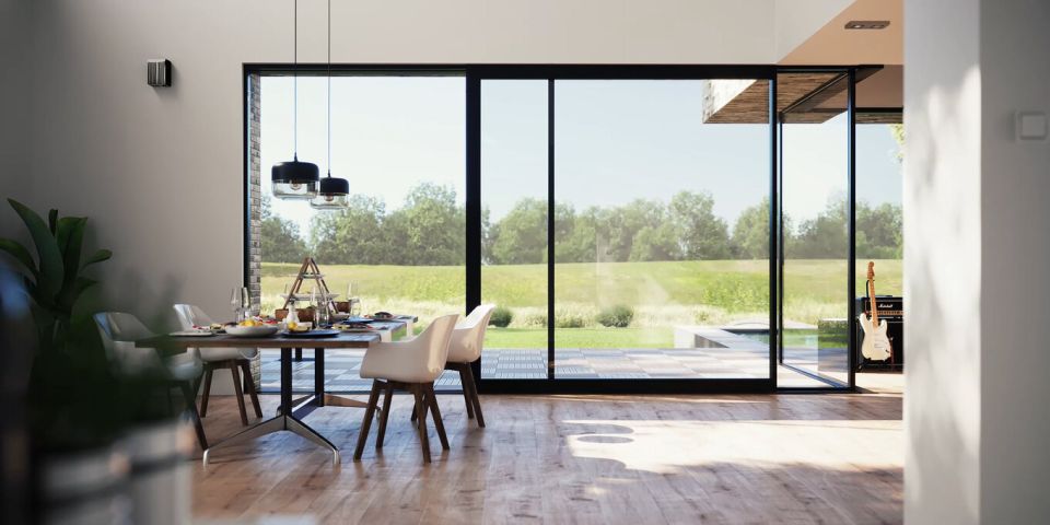 open sliding patio doors in modern home with garden in view 