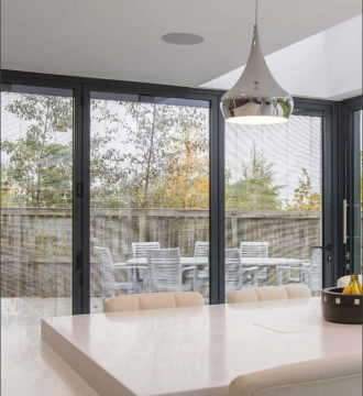 modern kitchen with blinded glass windows installed