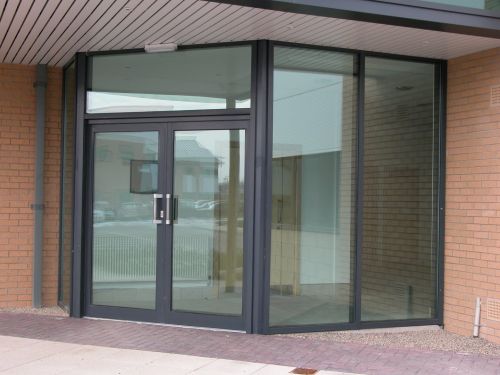 building with smart aluminium doors and glazing system