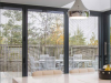 modern kitchen with blinded glass windows installed