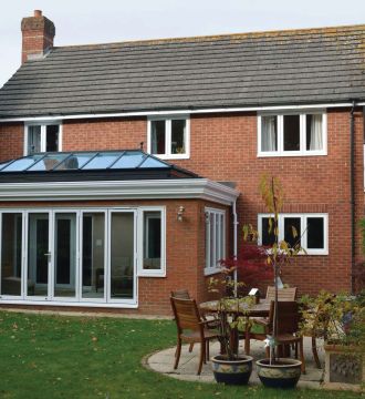 home wide shot with all windows in view including conservatory 