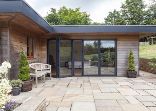 open bi-fold doors on modern home