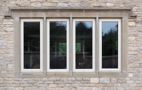 Four windows on the front of a building