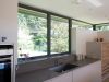 Kitchen windows above a sink in a modern home