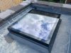 a skypod window on the roof of a house