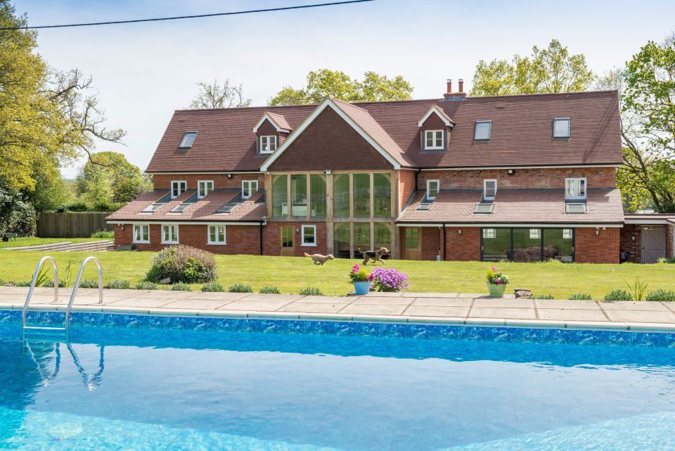 home wide shot with all windows in view including conservatory 