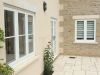 windows and door at the front of a house