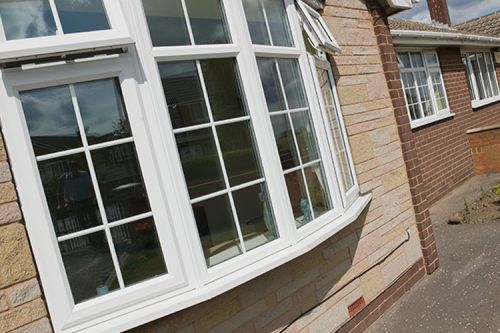 open windows on the front of a house