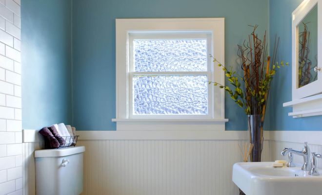 a bathroom window with obscure glass installed