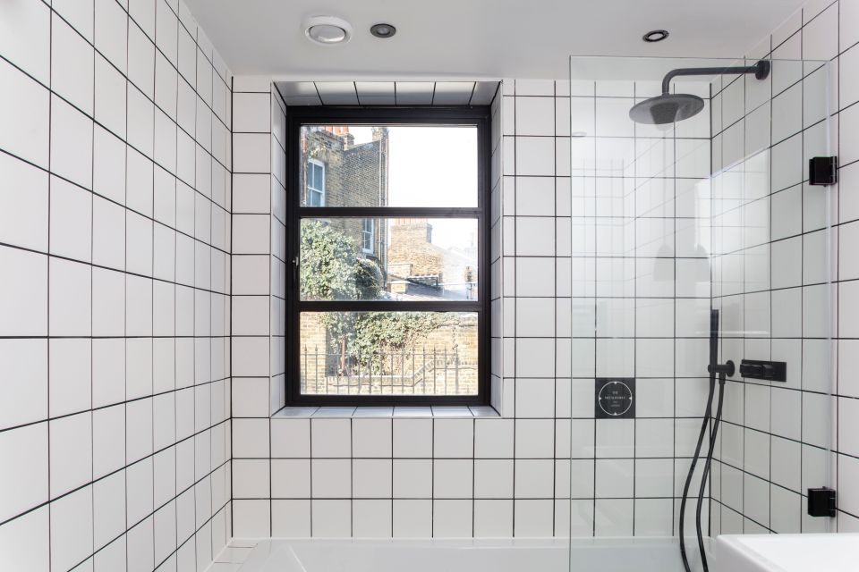 Single bathroom window with shower in view